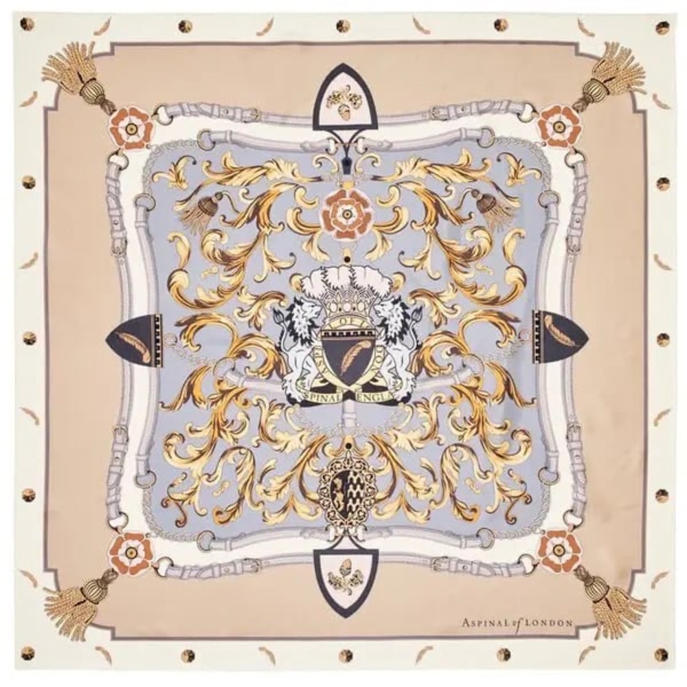 ASPINAL OF LONDON is a luxurious scarf. The print features the recognizable and